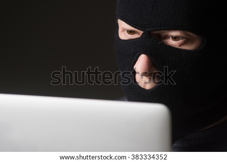 Hacker in a mask