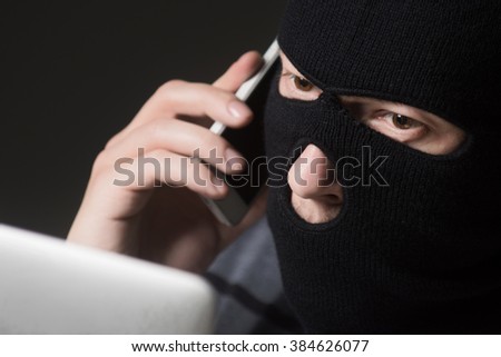 Hacker in a mask