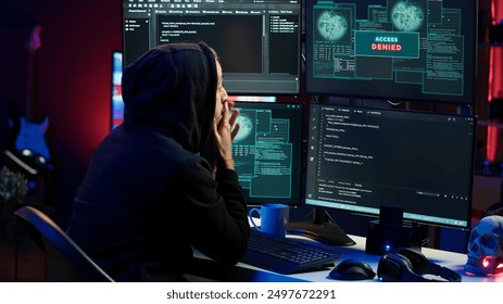Hacker receiving access denied error message after being contracted by company in secret to do corporate espionage and steal information on competitor products to gain marketplace advantage, camera A - Powered by Shutterstock - Get 15% off with code: PIKWIZARD15