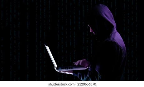 Hacker security cyber attack. Digital laptop in hacker man hand isolated on black. Internet web hack technology. Login and password, cybersecurity banner concept