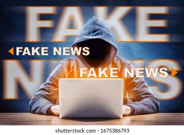 A Hacker Spreading Fake News From A Laptop