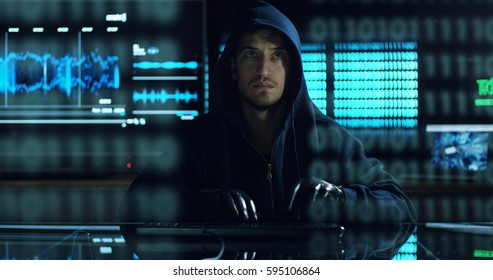 Hacker tries to enter the system using codes and numbers to find out the security password.The hacker enters the software to steal login information.Concept: immersive technology,augmented reality