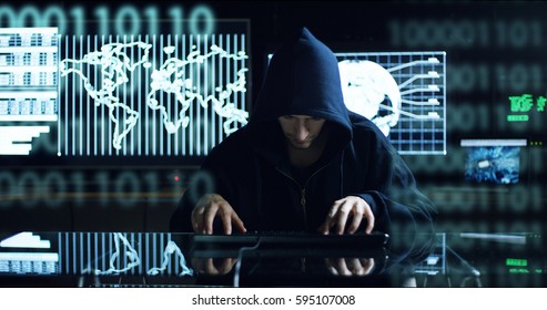 Hacker tries to enter the system using codes and numbers to find out the security password.The hacker enters the software to steal login information.Concept: immersive technology,augmented reality