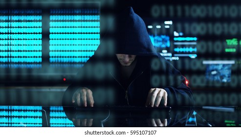 Hacker tries to enter the system using codes and numbers to find out the security password.The hacker enters the software to steal login information.Concept: immersive technology,augmented reality