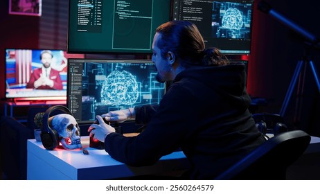 Hacker uploading script on SSD that can launch DDoS attacks on any website. Cybercriminal writing program that can crash servers, downloading it on storage drive, camera B