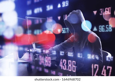 Hacker using computer and business statistics hologram. Hacking and cyber attack concept.