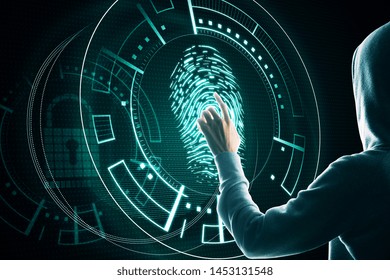 Hacker using creative blurry finger print scan interface. Hacking and ID concept.