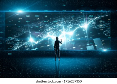 Hacker using creative glowing big data interface. Malware and futuristic concept.