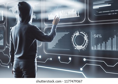 Hacker using digital business interface on blurry office interior background. Future and phishing concept. Double exposure