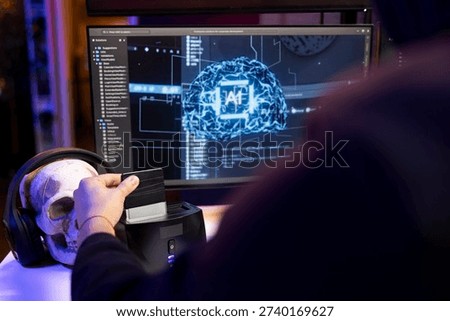 Hacker using hard drive with sensitive information obtained by running neural network software to breach company locked databases. Man uploading stolen data on SSD after finishing cyber attacks