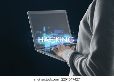 Hacker using laptop with abstract glowing big data glitch on black background. Hacking and theft concept. Unique Design Abstract Digital Pixel Noise Glitch Error Video Damage