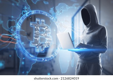 Hacker using laptop with creative glowing global bitcoin hologram on blurry office interior background. Hacking, blockchain and crypto concept. Double exposure