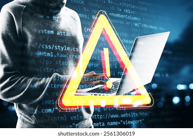 A hacker using a laptop with a digital warning symbol overlaid on code background, highlighting cybersecurity threats and risks concept
