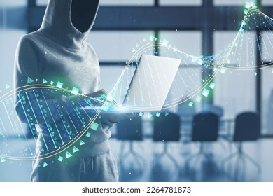 Hacker using laptop with glowing binary code DNA helix on blurry office interior background. Human genome, hacking, phishing and innovative technologies concept. Double exposure