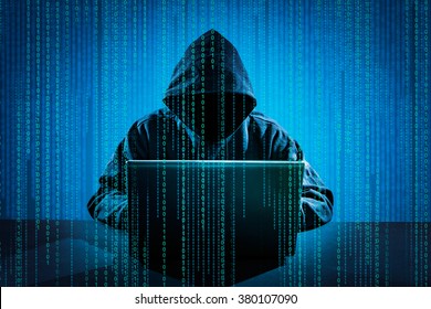 Hacker using laptop. Hacking the Internet. - Shutterstock ID 380107090