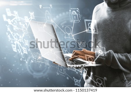 Hacker using laptop with interface on blurry background. Hacking and criminal concept. Double exposure 