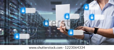 Hacker using laptop with interface on blurry background. Hacking and jacking concept. Double exposure