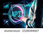 Hacker using laptop keyboard with creative API hologram on blurry background. Application Programming Interface concept. Interaction with digital icons representing API development, security