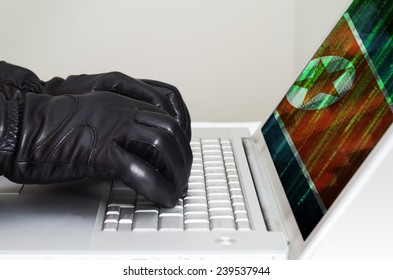 Hacker Wearing Black Gloves Using A Laptop With North Korea Flag In The Background