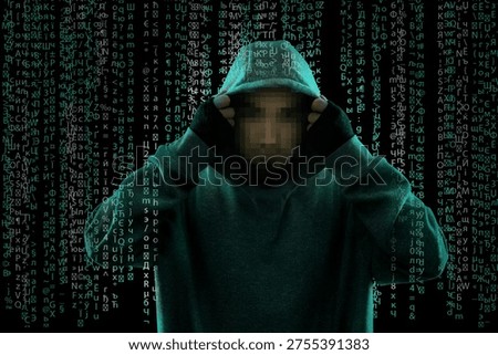 Hacker wearing hood and programming code running through him. Cyber criminal