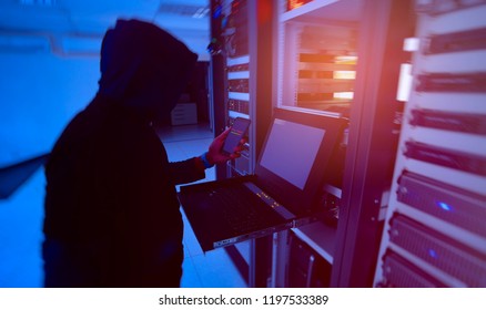 Hacker will hacking and steal data information in the server room of technology data center is concept - Powered by Shutterstock - Get 15% off with code: PIKWIZARD15