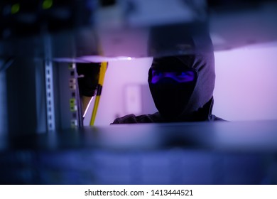 Hacker will hacking and steal data information in data center room is concept.