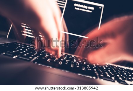Hacker in Work. High Speed Computer Keyboard Typing by Professional Hacker. Hacking the Internet Photo Concept.