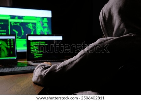 the hacker workin on the computer.cyber terror. 