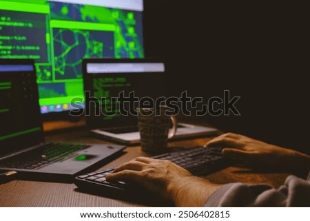 the hacker workin on the computer.cyber terror. 