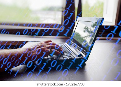 hackers breaking into a computer system. the concept of a laptop with codes to break into the security system. selective focus.