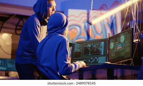 Hackers in secret underground warehouse trying to steal valuable data by targeting governmental websites but getting access denied error message, having cyber attacks rejected