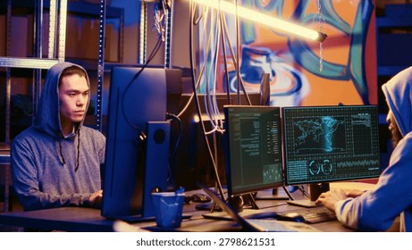 Hackers in underground hideaway utilizing technical knowhow of bugs and exploits to break into computer systems and access valuable data, bypassing firewalls and login process.