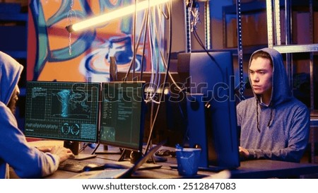 Hackers in underground hideaway utilizing technical knowhow of bugs and exploits to break into computer systems and access valuable data, bypassing firewalls and login process