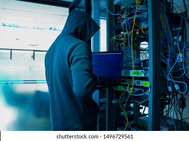 Hackers who steal into the organization to steal important information for ransom By embedding viruses on the server. - Shutterstock ID 1496729561