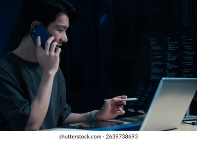 Hacking and malware concept. Hacker using abstract laptop with binary code digital interface. 