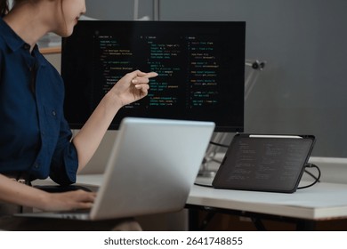 Hacking and malware concept. Hacker using abstract laptop with binary code digital interface.