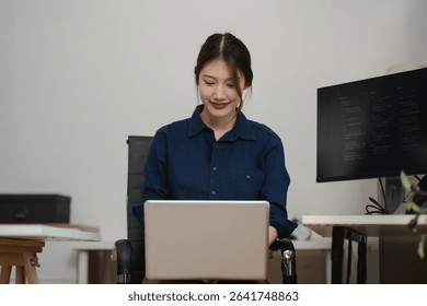 Hacking and malware concept. Hacker using abstract laptop with binary code digital interface.