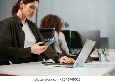 Hacking and malware concept. Hacker using abstract laptop with binary code digital interface.	