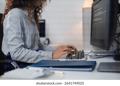 Hacking and malware concept. Hacker using abstract laptop with binary code digital interface.	