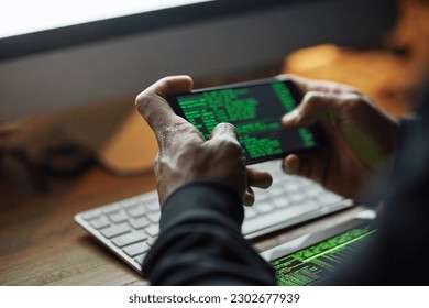 Hacking, phone screen and man hands for software data, crack code or password and internet or cybersecurity crime. Online, cyber thief and coding system of person or hacker on cellphone or mobile app