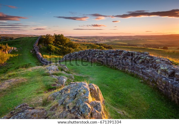 Hadrian\'s Wall near sunset at Walltown / Hadrian\'s\
Wall is a World Heritage Site in the beautiful Northumberland\
National Park. Popular with walkers along the Hadrian\'s Wall Path\
and Pennine Way