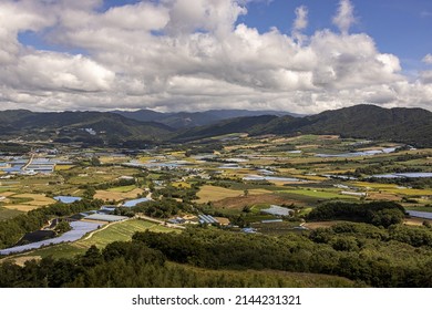 Haean-myeon, Yanggu-gun, Gangwon-do, South Korea - September 16, 2021: Aerial And Summer View Of Mountain Ridge And Farming Villages With Houses And Field Near DMZ At Punch Bowl Basin
