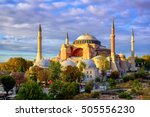 Hagia Sophia domes and minarets in the old town of Istanbul, Turkey, on sunset