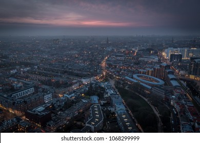 The Hague City Skyline And Aerial Skyline With Urban Skycrapers By Night