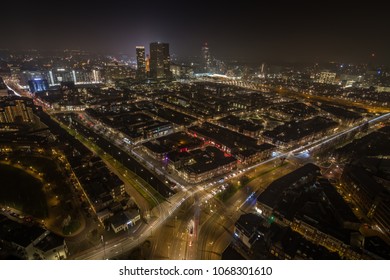 The Hague City Skyline And Aerial View With Urban Skycrapers By Night