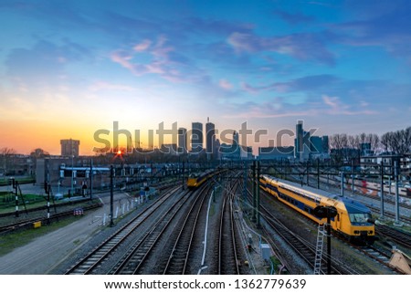 The Hague (Den Haag in Dutch) skyline during the sunset moment behind the train station