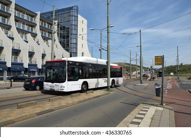 The Hague (Den Haag), The Netherlands - May 06, 2015. Tne HTM Buzz Bus Just Left The Terminus And Enters The Segregation In The Resort Town Of Scheveningen