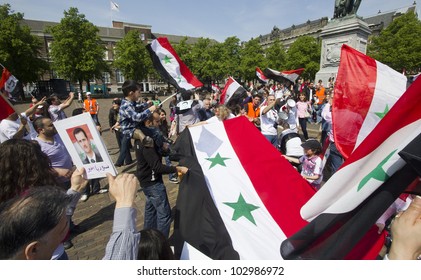 THE HAGUE, HOLLAND - MAY 19: Syrians demonstrate for Syria and Assad in the center of The Hague, Holland on May 19, 2012