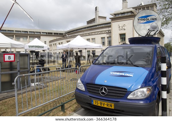 The Hague, Holland -\
May 27, 2011: TV Crews in front of the Yugoslavia Tribunal in The\
Hague, Holland, where Serbian ex-general Mladic will be prosecuted\
for war crimes\
