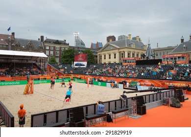 The Hague, The Netherlands -? June 28, 2015: Beach Volleyball match between Canada and France in the stadium in The Hague, The Netherlands with the Mauritshuis during the 2015 World Championships.